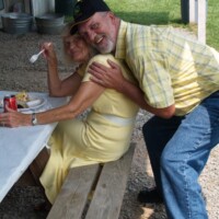 David gives Alice a quick hug.